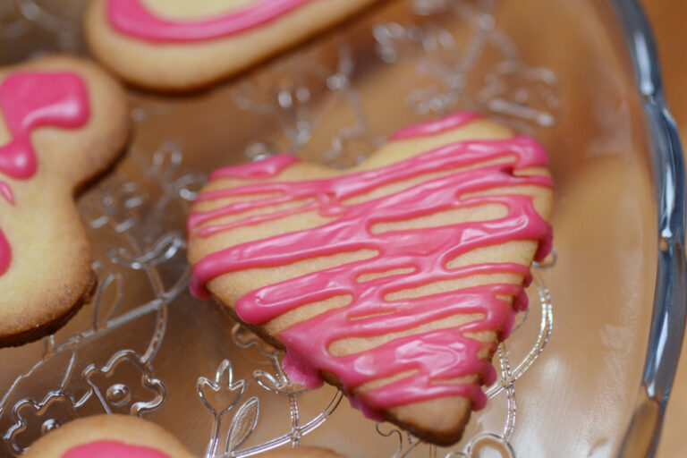 Heart shaped cookies with pink sugar icing