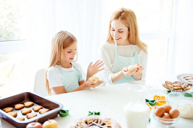 mother and daughter cooking together