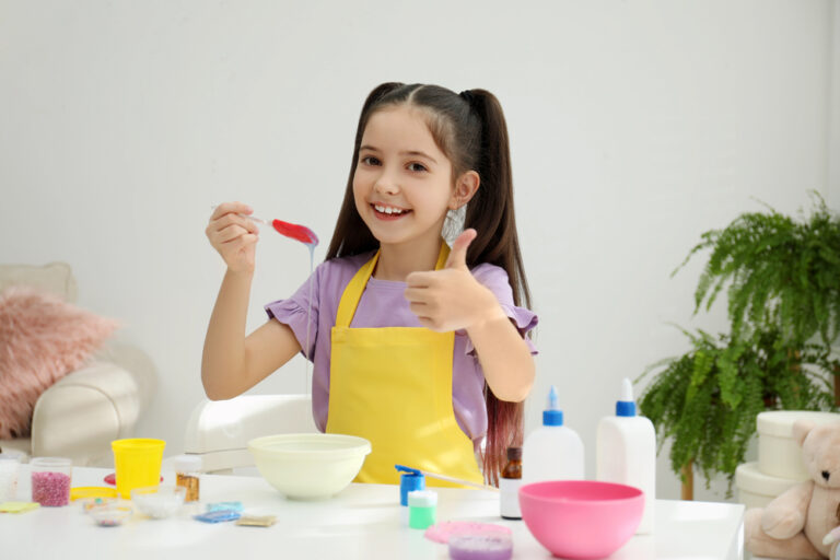 Cute little girl mixing ingredients